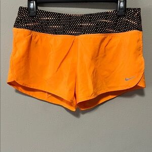 Nike Women's Orange Dri-Fit Athletic Shorts with Black Dotted Waistband